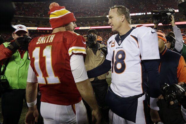 Denver Broncos quarterback Peyton Manning (18) greets Kansas City Chiefs quarterback Alex Smith (11) after an NFL football game, Sunday, Dec. 1, 2013, in Kansas City, Mo. The Broncos won 35-28. (AP Photo/Charlie Riedel) Denver Broncos quarterback Peyton Manning (18) greets Kansas City Chiefs quarterback Alex Smith (11) after an NFL football game, Sunday, Dec. 1, 2013, in Kansas City, Mo. The Broncos won 35-28. (AP Photo/Charlie Riedel)