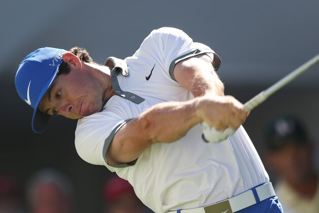 Rory McIlroy, of Northern Ireland, tees off on the first hole in the final round of the BMW Championship golf tournament in Cherry Hills Village, Colo., Sunday, Sept. 7, 2014. (AP Photo/David Zalubowski)