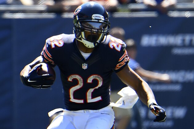 Sep 7, 2014; Chicago, IL, USA; Chicago Bears running back Matt Forte (22) rushes the ball against the Buffalo Bills during the second half at Soldier Field. Buffalo Bills defeat the Chicago Bears 23-20 in overtime. Mandatory Credit: Mike DiNovo-USA TODAY Sports