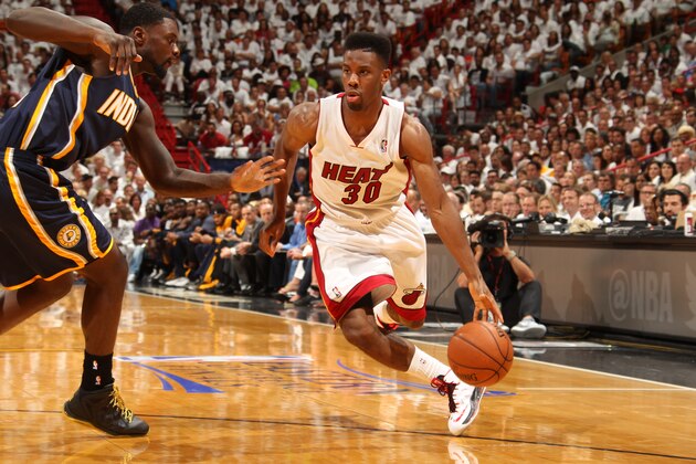 MIAMI, FL - May 26: Norris Cole #30 of the Miami Heat drives to the basket against the Indiana Pacers in Game Four of the Eastern Conference Finals during the 2014 NBA Playoffs at the American Airlines Arena in Miami, Florida on May 26, 2014. NOTE TO USER: User expressly acknowledges and agrees that, by downloading and/or using this photograph, user is consenting to the terms and conditions of the Getty Images License Agreement. Mandatory copyright notice: Copyright NBAE 2014 (Photo by Issac Baldizon/NBAE via Getty Images)