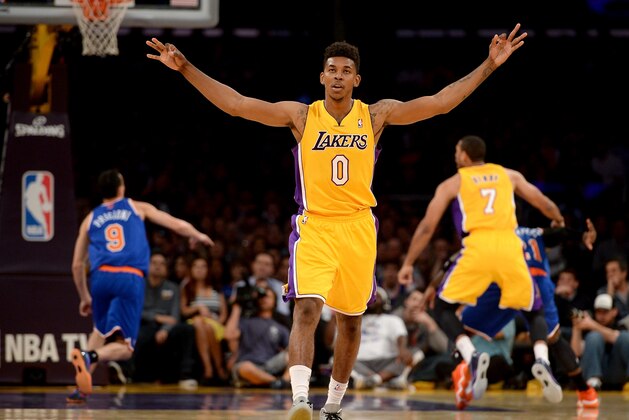 LOS ANGELES, CA - MARCH 25:  Nick Young #0 of the Los Angeles Lakers reacts after his shot during the game against the New York Knicks at Staples Center on March 25, 2014 in Los Angeles, California.   NOTE TO USER: User expressly acknowledges and agrees that, by downloading and or using this Photograph, user is consenting to the terms and condition of the Getty Images License Agreement.  (Photo by Harry How/Getty Images)