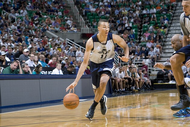 SALT LAKE CITY, UT - JULY 8:  Dante Exum #11 of the Utah Jazz drives during an open scrimmage at Energy Solutions Arena on July 8, 2014 in Salt Lake City, Utah. NOTE TO USER: User expressly acknowledges and agrees that, by downloading and or using this Photograph, User is consenting to the terms and conditions of the Getty Images License Agreement. Mandatory Copyright Notice: Copyright 2014 NBAE (Photo by Melissa Majchrzak/NBAE via Getty Images)
