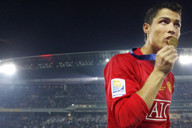 Cristiano Ronaldo of England's Manchester United kisses his medal after beating Ecuador's Liga Deportiva Universitaria Quito 1-0 in their final match to win the FIFA Club World Cup soccer tournament in Yokohama, Japan, Sunday, Dec. 21, 2008. (AP Photo/Junji Kurokawa)