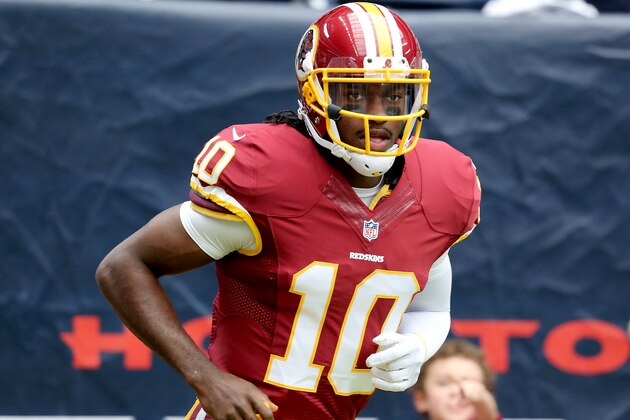 HOUSTON, TX- SEPTEMBER 07: Washington Redskins quarterback Robert Griffin III #10 warms up before playing against the Houston Texans on September 7, 2014 at NRG Stadium in Houston, Texas. (Photo by Thomas B. Shea/Getty Images)