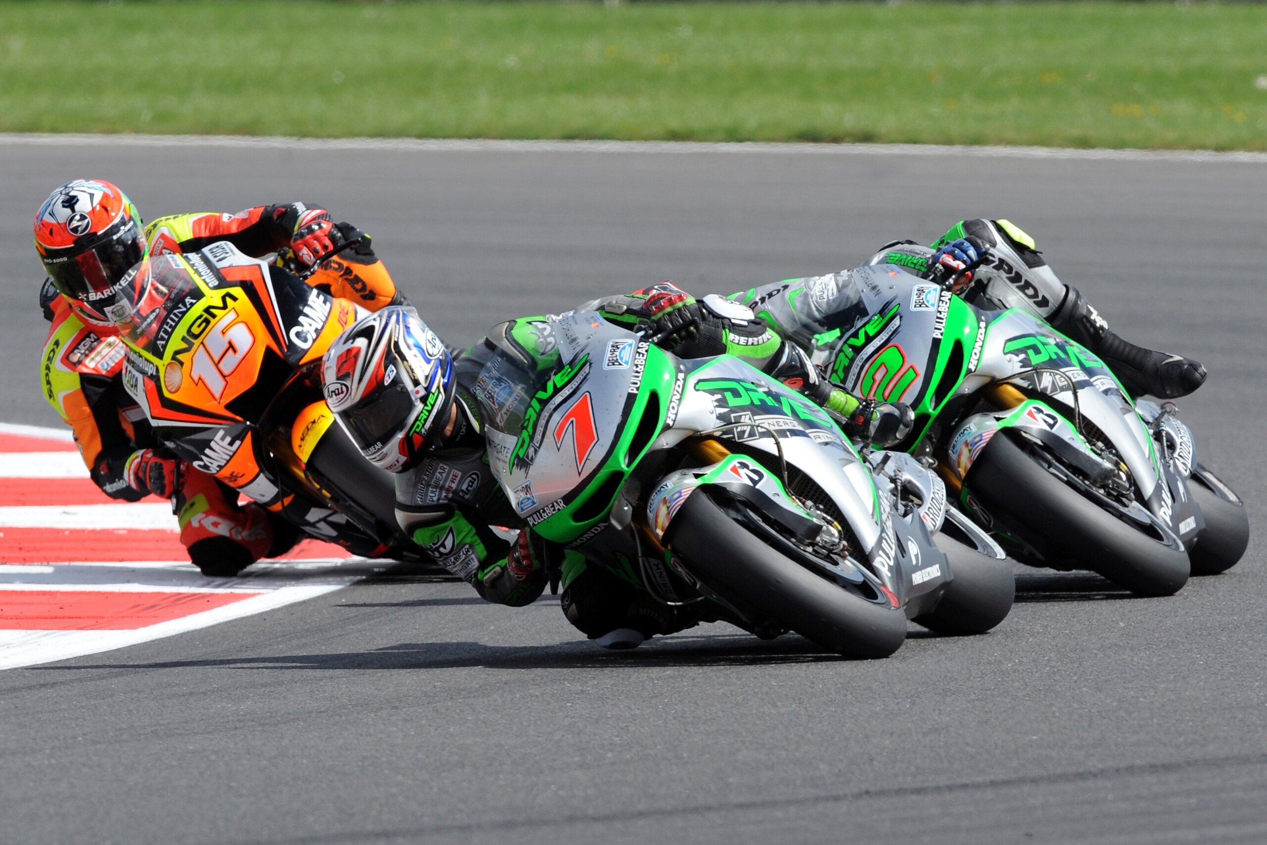 Japan's Hiroshi Aoyama of Drive M7 Honda, center,  during the British Grand Prix Moto GP race at Silverstone, England, Sunday, Aug. 31, 2014. (AP Photo/Rui Vieira)