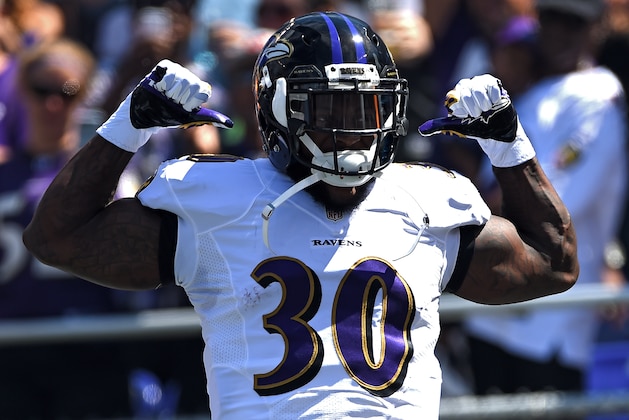 BALTIMORE, MD - SEPTEMBER 07: Running back Bernard Pierce #30 of the Baltimore Ravens is introduced before playing the Cincinnati Bengals at M&T Bank Stadium on September 7, 2014 in Baltimore, Maryland. The Cincinnati Bengals won, 23-16. (Photo by Patrick Smith/Getty Images)