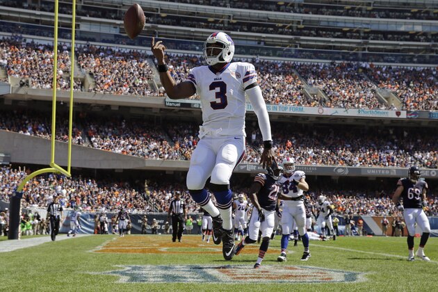 Buffalo Bills quarterback EJ Manuel (3) celebrates a touchdown during the first half of an NFL football game against the Chicago Bears  onSunday, Sept. 7, 2014, in Chicago. (AP Photo/Nam Y. Huh)