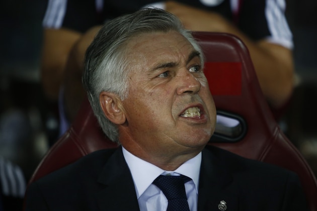 Real's coach Carlo Ancelotti, gestures during a Spanish Supercup second leg soccer match between Real Madrid and Atletico Madrid at Vicente Calderon stadium in Madrid, Spain, Friday, Aug. 22, 2014. (AP Photo/Andres Kudacki)