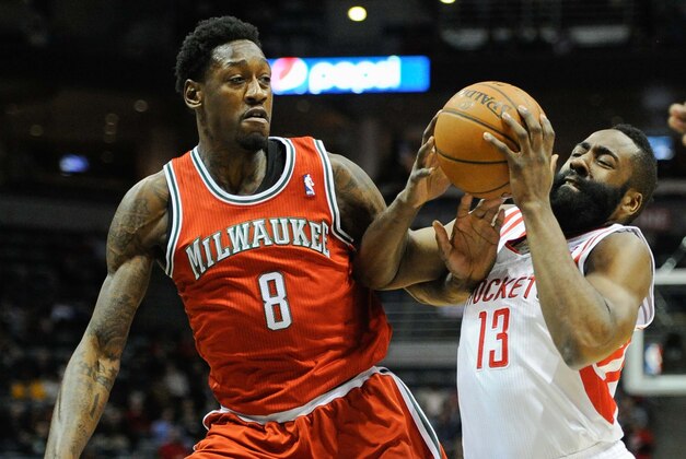 Feb 8, 2014; Milwaukee, WI, USA; Houston Rockets guard James Harden (13) drives for the basket against Milwaukee Bucks center Larry Sanders (8) in the first quarter at BMO Harris Bradley Center. Mandatory Credit: Benny Sieu-USA TODAY Sports Feb 8, 2014; Milwaukee, WI, USA; Houston Rockets guard James Harden (13) drives for the basket against Milwaukee Bucks center Larry Sanders (8) in the first quarter at BMO Harris Bradley Center. Mandatory Credit: Benny Sieu-USA TODAY Sports