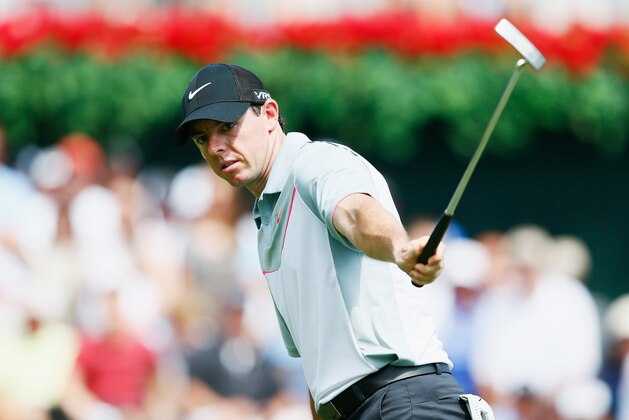 ATLANTA, GA - SEPTEMBER 12:  Rory McIlroy of Northern Ireland celebrates his birdie putt on the 18th green en route to a five-under par 65 during the second round of the TOUR Championship by Coca-Cola at the East Lake Golf Club on September 12, 2014 in Atlanta, Georgia.  (Photo by Kevin C. Cox/Getty Images)