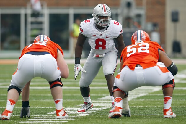 Ohio State defensive lineman Noah Spence (8) lines up against Illinois offensive linesman Michael Heitz (74) and offensive linesman Alex Hill (52)during the first half of an NCAA college football game on Saturday, Nov. 16, 2013, in Champaign, Ill. (AP Photo/Jeff Haynes)