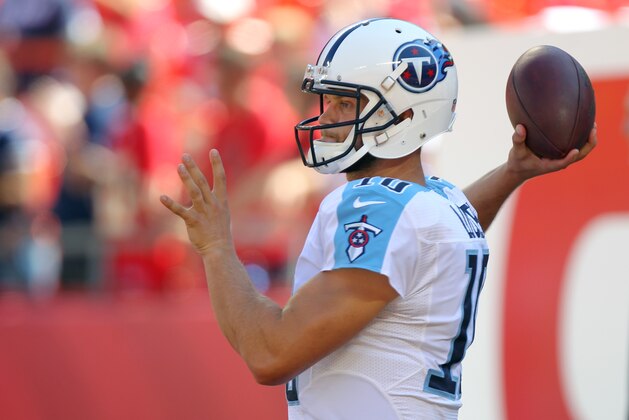 Tennessee Titans quarterback Jake Locker (10) throws before an NFL football game against the Kansas City Chiefs in Kansas City, Mo., Sunday, Sept. 7, 2014. (AP Photo/Ed Zurga)