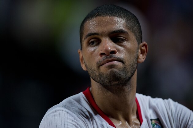 MADRID, SPAIN - SEPTEMBER 12: Nicolas Batum of France looks on defeated after loosing the 2014 FIBA World Basketball Championship semifinal match between France and Serbia at Palacio de los Deportes on September 12, 2014 in Madrid, Spain.  (Photo by Gonzalo Arroyo Moreno/Getty Images)