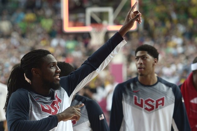 United States' Kenneth Faried celebrates his side's 96-68 win over Lithuania at the end of a Basketball World Cup semifinal match at the Palau Sant Jordi in Barcelona, Spain, Thursday, Sept. 11, 2014. The 2014 Basketball World Cup competition will take place in various cities in Spain from Aug. 30 through Sept. 14. (AP Photo/Manu Fernandez)