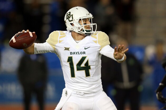 Baylor quarterback Bryce Petty (14) passes against Buffalo during the second half of an NCAA college football game on Friday, Sept. 12, 2014, in Amherst, N.Y. (AP Photo/Mike Groll)