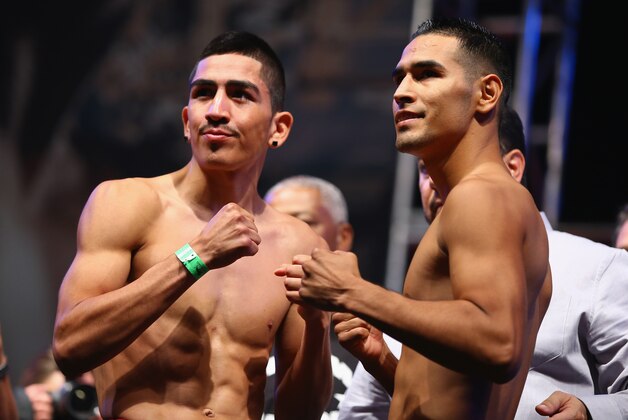 LAS VEGAS, NV - SEPTEMBER 12: WBC super bantamweight champion Leo Santa Cruz (L) and Manuel Roman pose during their official weigh-in at the MGM Grand Garden Arena on September 12, 2014 in Las Vegas, Nevada. Santa Cruz will defend his title against Roman on September 13 in Las Vegas. (Photo by Al Bello/Getty Images)