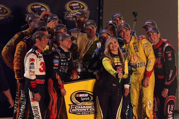 RICHMOND, VA - SEPTEMBER 06:  Miss Sprint Cup Kim Coon takes a selfie with Chase for the Sprint Cup qualifiers Jeff Gordon, driver of the #24 Drive to End Hunger Chevrolet, Kyle Busch, driver of the #18 M&M's Toyota, Carl Edwards, driver of the #99 Kelloggs/Frosted Flakes Ford, Ryan Newman, driver of the #31 Catepillar Chevrolet, Miss Sprint Cup Madison Martin, Miss Sprint Cup Kim Coon, Dale Earnhardt Jr., driver of the #88 Nationwide Insurance Chevrolet, Matt Kenseth, driver of the #20 Dollar General Toyota, Aric Almirola, driver of the #43 Gwaltney Ford, Brad Keselowski, driver of the #2 Miller Lite Ford, Denny Hamlin, driver of the #11 FedEx Express Toyota, Greg Biffle, driver of the #16 3M Call Before You Dig Ford, AJ Allmendinger, driver of the #47 Bush's Beans Chevrolet, Kasey Kahne, driver of the #5 Farmers Insurance Chevrolet, Joey Logano, driver of the #22 Shell-Pennzoil Ford, Kurt Busch, driver of the #41 Haas Automation Chevrolet, and Kevin Harvick, driver of the #4 Budweiser Chevrolet, after quali