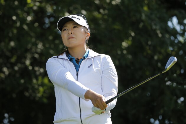 Mi Jung Hur of South Korea watches the flight of her ball on the second hole during the third round of the Evian Championship women's golf tournament in Evian, eastern France, Saturday, Sept. 13, 2014. (AP Photo/Laurent Cipriani)