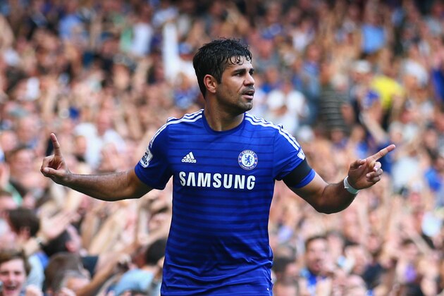 LONDON, ENGLAND - SEPTEMBER 13:  Diego Costa of Chelsea celebrates as scores his and his team's third goal during the Barclays Premier League match between Chelsea and Swansea City at Stamford Bridge on September 13, 2014 in London, England.  (Photo by Paul Gilham/Getty Images)