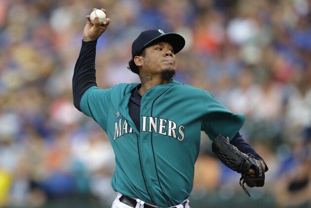 Seattle Mariners starting pitcher Felix Hernandez throws against the Toronto Blue Jays during a baseball game, Monday, Aug. 11, 2014, in Seattle. (AP Photo/Ted S. Warren)