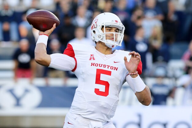 Sep 11, 2014; Provo, UT, USA; Houston Cougars quarterback John O'Korn (5) throws the ball down the field against the Brigham Young Cougars during the first quarter at Lavell Edwards Stadium. Mandatory Credit: Chris Nicoll-USA TODAY Sports