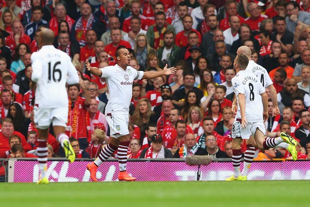 LIVERPOOL, ENGLAND - SEPTEMBER 13:  Gabriel Agbonlahor of Aston Villa celebrates scoring the opening goal during the Barclays Premier League match between Liverpool and Aston Villa at Anfield on September 13, 2014 in Liverpool, England.  (Photo by Alex Livesey/Getty Images)