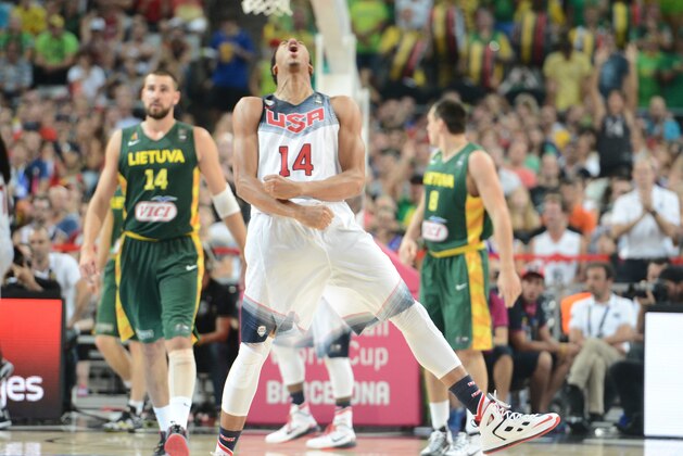 BARCELONA, SPAIN - SEPTEMBER 11: Anthony Davis #14 of the USA Basketball Men's National Team shows emotion in the game against the Lithuania National Team during the 2014 FIBA World Cup Semi-Finals at Palau Sant Jordi on September 11, 2014 in Barcelona, Spain.  NOTE TO USER: User expressly acknowledges and agrees that, by downloading and/or using this Photograph, user is consenting to the terms and conditions of the Getty Images License Agreement. Mandatory Copyright Notice: Copyright 2014 NBAE (Photo by Garrett Ellwood/NBAE via Getty Images)
