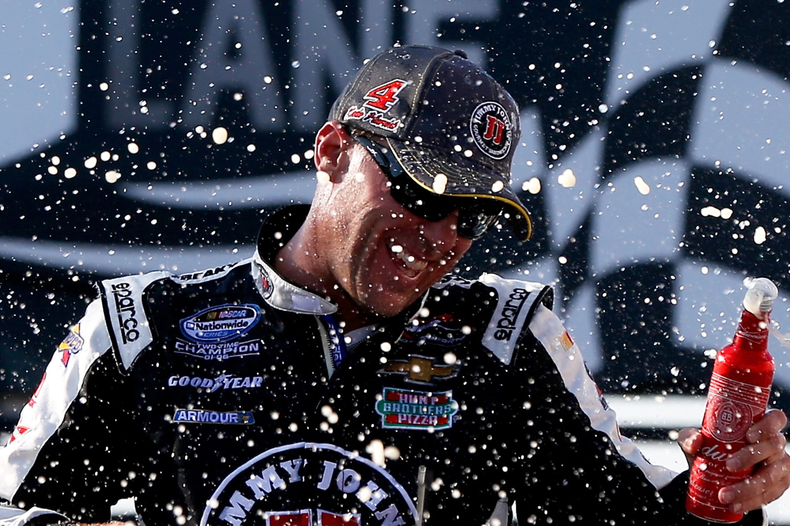 JOLIET, IL - SEPTEMBER 13:  Kevin Harvick, driver of the #5 Jimmy John's Chevrolet, celebrates in victory lane after winning the NASCAR Nationwide Series Jimmy John's Freaky Fast 300 at Chicagoland Speedway on September 13, 2014 in Joliet, Illinois.  (Photo by Sean Gardner/Getty Images)