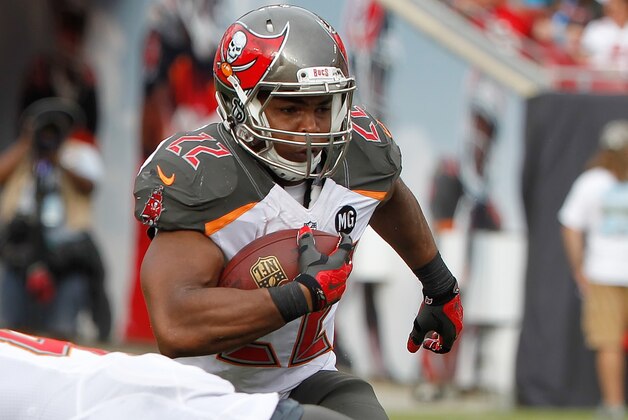Sep 7, 2014; Tampa, FL, USA; Tampa Bay Buccaneers running back Doug Martin (22) runs with the ball during the first half against the Carolina Panthers at Raymond James Stadium. Mandatory Credit: Kim Klement-USA TODAY Sports Sep 7, 2014; Tampa, FL, USA; Tampa Bay Buccaneers running back Doug Martin (22) runs with the ball during the first half against the Carolina Panthers at Raymond James Stadium. Mandatory Credit: Kim Klement-USA TODAY Sports
