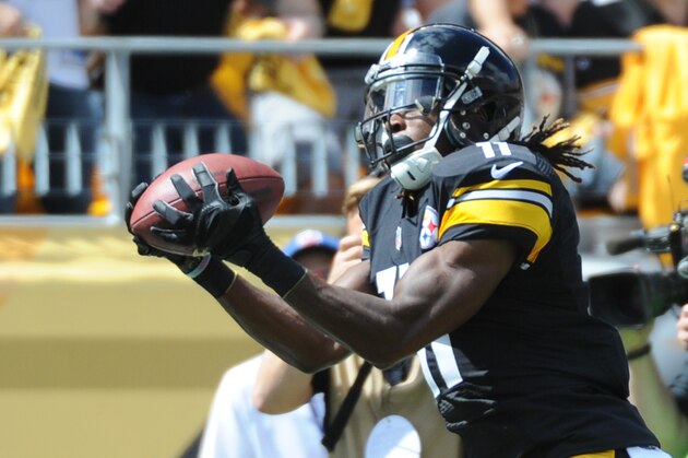 FILE - In this Sept. 7, 2014, file photo, Pittsburgh Steelers wide receiver Markus Wheaton (11) catches a pass against the Cleveland Browns in an NFL football game in Pittsburgh. Wheaton spent his rookie season knowing he could make plays but wondering if his body would ever cooperate. Consider the questions answered after the second-year wide receiver set up the winning kick in Pittsburgh's opening victory Cleveland. (AP Photo/Don Wright, File)