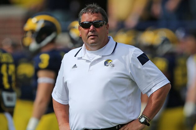ANN ARBOR, MI - SEPTEMBER 13: Michigan Wolverines head football coach Brady Hoke watches the pregame warm ups prior to the start of the game against the Miami Redhawks Michigan Stadium on September 13, 2014 in Ann Arbor, Michigan.  (Photo by Leon Halip/Getty Images)