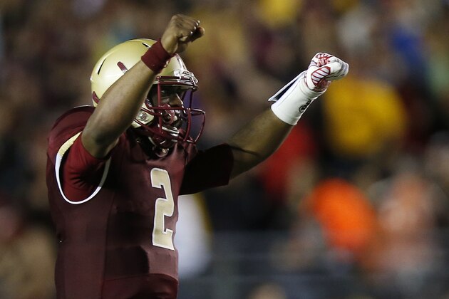 BOSTON, MA- SEPTEMBER 13:  Quarterback Tyler Murphy #2 of the Boston College Eagles celebrates a touchdown against the USC Trojans during the first half at Alumni Stadium on September 13 in Chestnut Hill, Massachusetts.  (Photo by Winslow Townson/Getty Images)