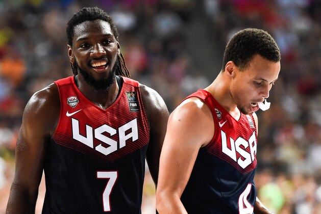 BARCELONA, SPAIN - SEPTEMBER 09:  Kenneth Faried #7 and Stephen Curry #4 of the USA Basketball Men's National Team looks on during 2014 FIBA Basketball World Cup quarter-final match between Lithuania and Turkey at Palau Sant Jordi on September 9, 2014 in Barcelona, Spain.  (Photo by David Ramos/Getty Images)