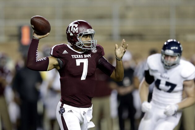 Texas A&M quarterback Kenny Hill (7) throws a pass against Rice during the first quarter of an NCAA college football game Saturday, Sept. 13, 2014, in College Station, Texas. (AP Photo/David J. Phillip)