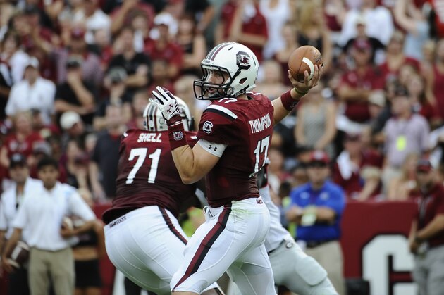 South Carolina quarterback Dylan Thompson (17) throws the ball against Georgia during the first half of an NCAA college football game on Saturday, Sept. 13, 2014, in Columbia, S.C. South Carolina won 38-35. (AP Photo/Rainier Ehrhardt)