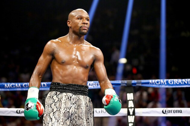 LAS VEGAS, NV - SEPTEMBER 13: Floyd Mayweather Jr. looks on while taking on Marcos Maidana during their WBC/WBA welterweight title fight at the MGM Grand Garden Arena on September 13, 2014 in Las Vegas, Nevada. (Photo by Al Bello/Getty Images) LAS VEGAS, NV - SEPTEMBER 13: Floyd Mayweather Jr. looks on while taking on Marcos Maidana during their WBC/WBA welterweight title fight at the MGM Grand Garden Arena on September 13, 2014 in Las Vegas, Nevada. (Photo by Al Bello/Getty Images)