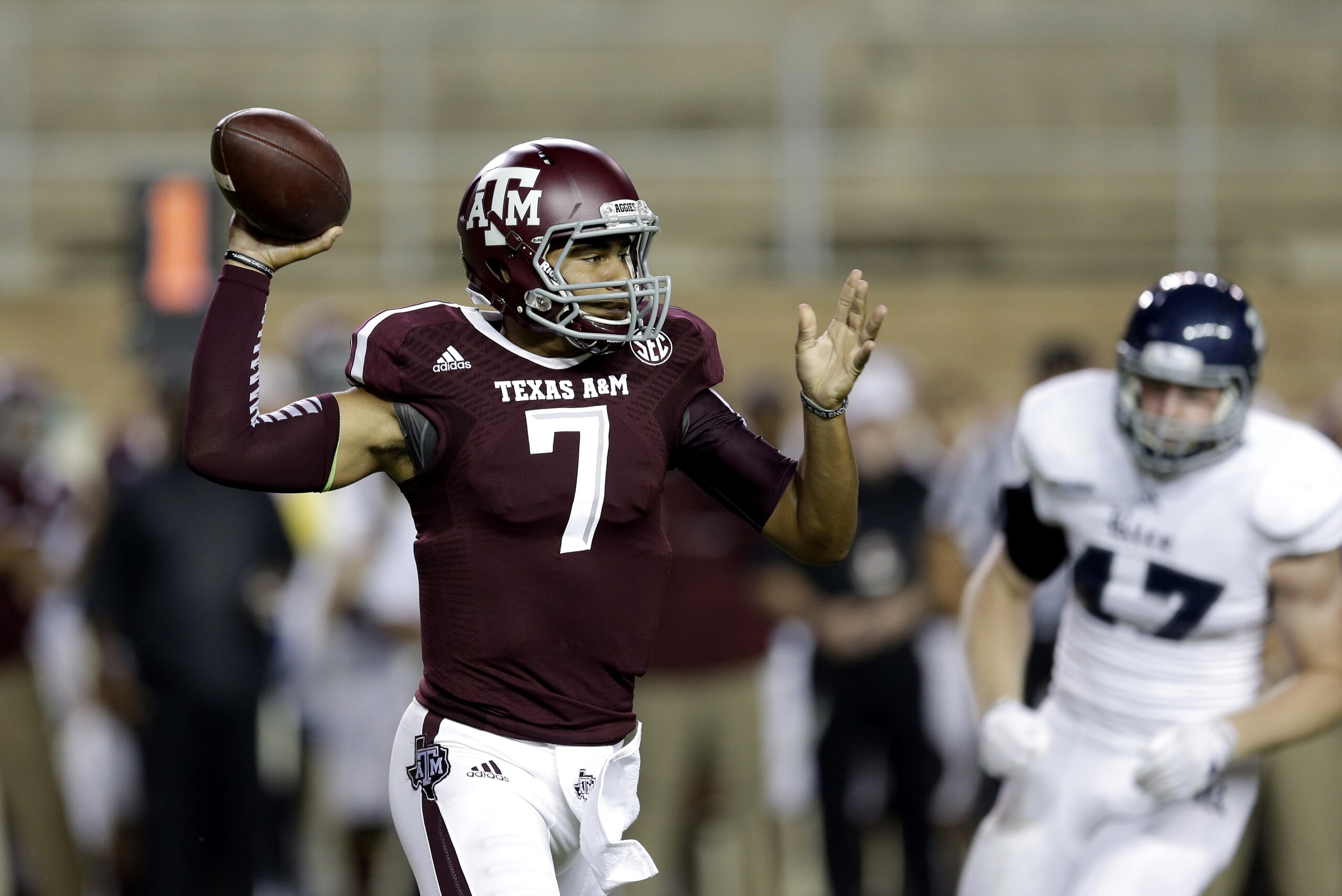 Texas A&M quarterback Kenny Hill (7) throws a pass against Rice during the first quarter of an NCAA college football game Saturday, Sept. 13, 2014, in College Station, Texas. (AP Photo/David J. Phillip)