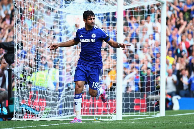 LONDON, ENGLAND - SEPTEMBER 13:  Diego Costa of Chelsea celebrates as scores his and his team's third goal during the Barclays Premier League match between Chelsea and Swansea City at Stamford Bridge on September 13, 2014 in London, England.  (Photo by Paul Gilham/Getty Images)