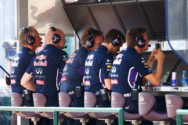 BUDAPEST, HUNGARY - JULY 26:  Adrian Newey, the Infiniti Red Bull Racing Chief Technical Officer works on from the pit wall during qualifying ahead of the Hungarian Formula One Grand Prix at Hungaroring on July 26, 2014 in Budapest, Hungary.  (Photo by Dan Istitene/Getty Images)