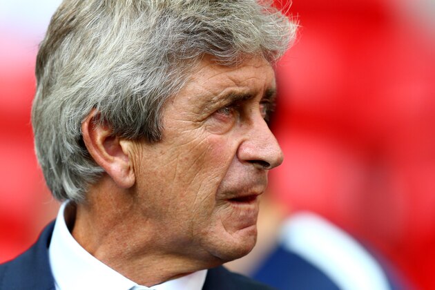 LONDON, ENGLAND - AUGUST 10:  Manuel Pellegrini, manager of Manchester City looks on during the FA Community Shield match between Manchester City and Arsenal at Wembley Stadium on August 10, 2014 in London, England.  (Photo by Clive Mason/Getty Images)