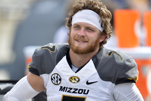 Missouri Tigers quarterback Maty Mauk (7) stands on the sideline in the fourth quarter of a 49-24 win over the Toledo Rockets in an NCAA college football game in Toledo, Ohio, Saturday, Sept. 6, 2014. (AP Photo/David Richard)