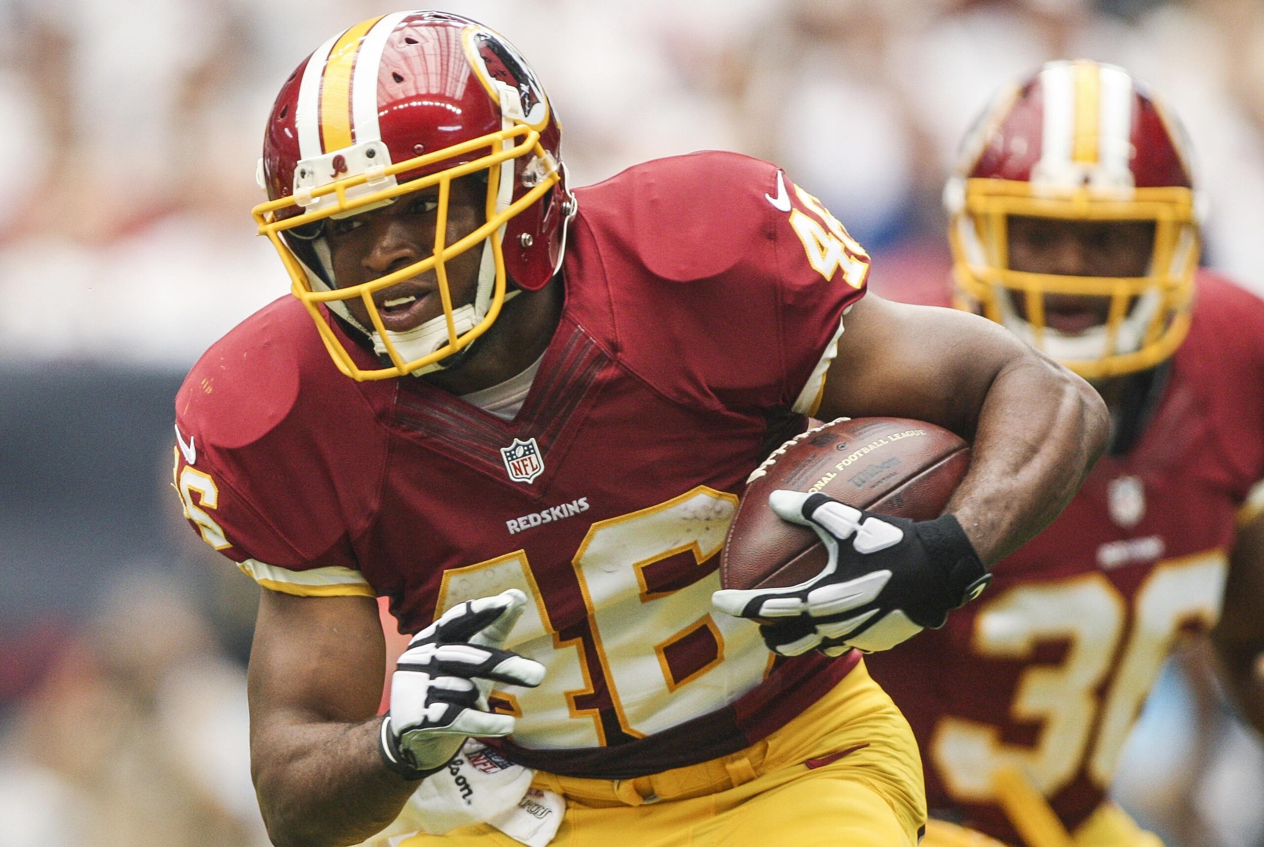 Sep 7, 2014; Houston, TX, USA; Washington Redskins running back Alfred Morris (46) rushes during the first quarter against the Houston Texans at NRG Stadium. Mandatory Credit: Troy Taormina-USA TODAY Sports
