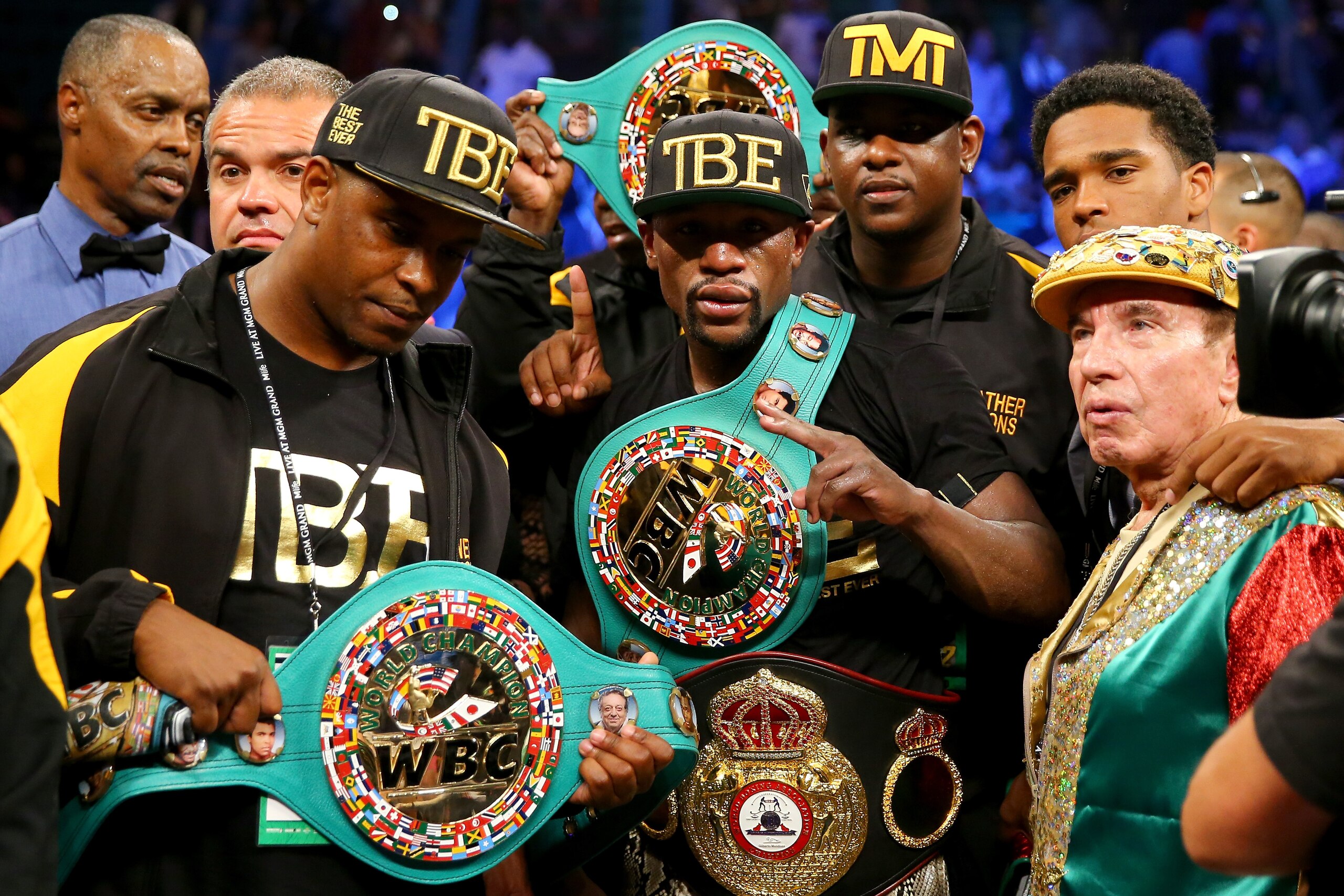 LAS VEGAS, NV - SEPTEMBER 13:  Floyd Mayweather Jr. celebrates his unanimous-decision victory over Marcos Maidana during their WBC/WBA welterweight title fight at the MGM Grand Garden Arena on September 13, 2014 in Las Vegas, Nevada.  (Photo by Al Bello/Getty Images)