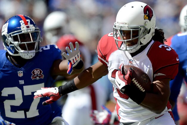 EAST RUTHERFORD, NJ - SEPTEMBER 14:  Running back Andre Ellington #38 of the Arizona Cardinals carries the ball against the New York Giants during a game at MetLife Stadium on September 14, 2014 in East Rutherford, New Jersey.  (Photo by Ron Antonelli/Getty Images)