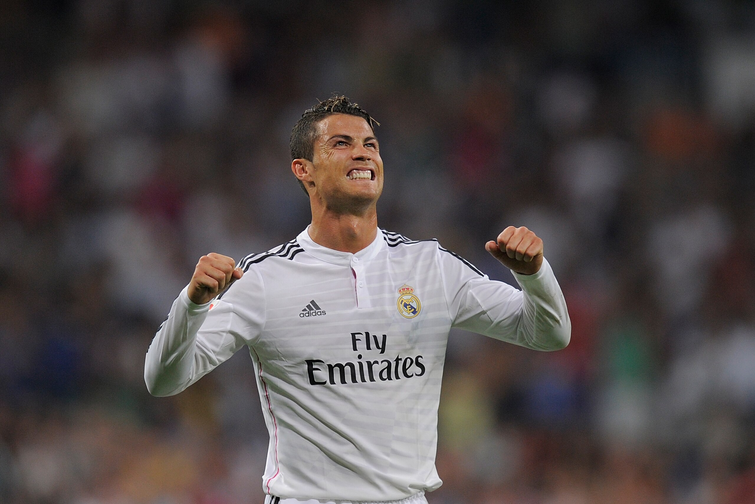 MADRID, SPAIN - AUGUST 25:  Cristiano Ronaldo of Real Madrid celebrates after scoring Real's 2nd goal during the La liga match between Real Madrid CF and Cordoba CF at Estadio Santiago Bernabeu on August 25, 2014 in Madrid, Spain.  (Photo by Denis Doyle/Getty Images)