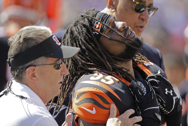 Cincinnati Bengals outside linebacker Vontaze Burfict (55) leaves the field after an injury during the first half of an NFL football game against the Baltimore Ravens in Baltimore, Md., Sunday, Sept. 7, 2014. (AP Photo/Patrick Semansky)