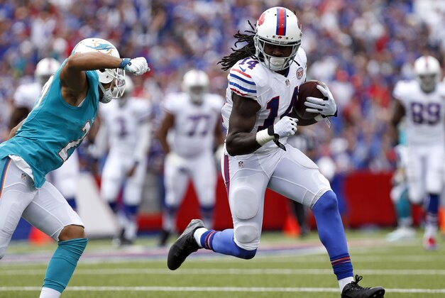 Sep 14, 2014; Orchard Park, NY, USA; Buffalo Bills wide receiver Sammy Watkins (14) runs after a catch as Miami Dolphins strong safety Jimmy Wilson (27) pursues during the first half at Ralph Wilson Stadium. Mandatory Credit: Kevin Hoffman-USA TODAY Sports Sep 14, 2014; Orchard Park, NY, USA; Buffalo Bills wide receiver Sammy Watkins (14) runs after a catch as Miami Dolphins strong safety Jimmy Wilson (27) pursues during the first half at Ralph Wilson Stadium. Mandatory Credit: Kevin Hoffman-USA TODAY Sports