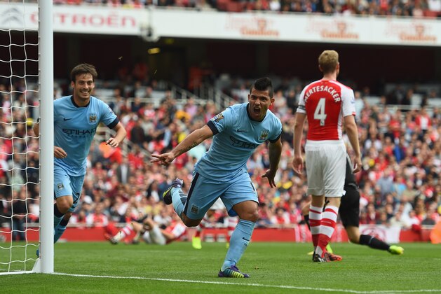 LONDON, ENGLAND - SEPTEMBER 13:  Sergio Aguero of Manchester City celebrates after scoring the first goal during the Barclays Premier League match between Arsenal and Manchester City at Emirates Stadium on September 13, 2014 in London, England.  (Photo by Shaun Botterill/Getty Images)