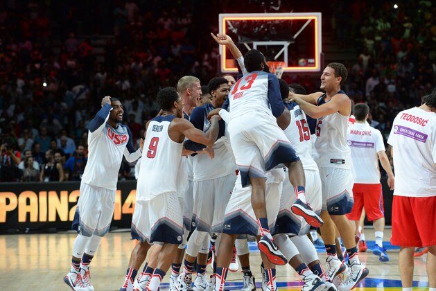 MADRID, SPAIN - SEPTEMBER 14: The USA Men's National Team celebrates after defeating the Serbia National Team during the 2014 FIBA World Cup Finals at Palacio de Deportes on September 14, 2014 in Madrid, Spain.  NOTE TO USER: User expressly acknowledges and agrees that, by downloading and/or using this Photograph, user is consenting to the terms and conditions of the Getty Images License Agreement. Mandatory Copyright Notice: Copyright 2014 NBAE (Photo by Jesse D. Garrabrant/NBAE via Getty Images)