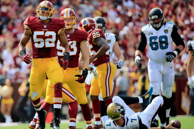 LANDOVER, MD - SEPTEMBER 14: Inside linebacker Keenan Robinson #52 of the Washington Redskins reacts during the second half of a game against the Jacksonville Jaguars at FedExField on September 14, 2014 in Landover, Maryland.  (Photo by Rob Carr/Getty Images)